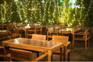 Dining tables at an outdoor restaurant 